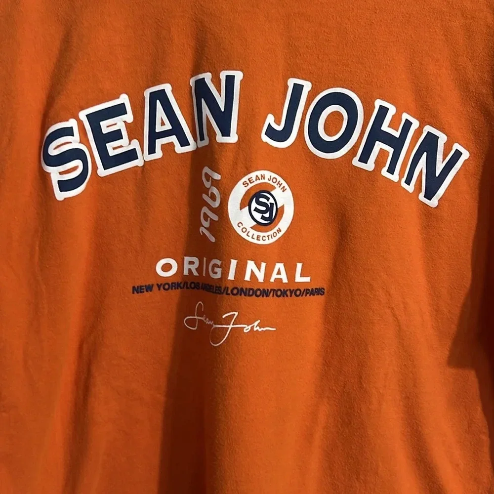 Sean John boys orange tee - size Medium (12/14)